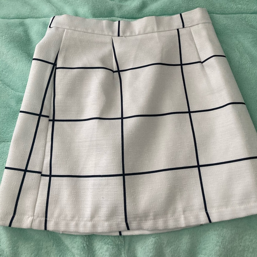 white and black mini skirt